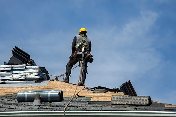 Professional Roof Replacement technician working in Hufsmith, TX